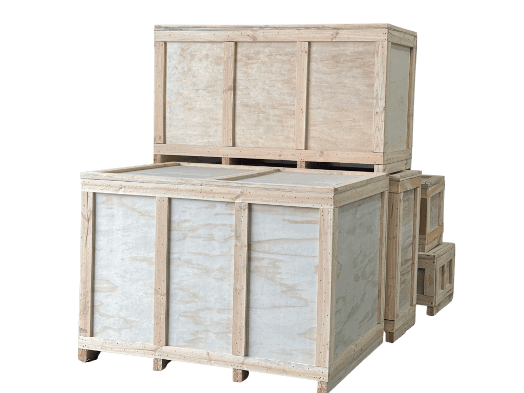 Four large wooden packing crates stacked on and beside each other, with a few smaller crates to the right, all set against a plain white background—perfect for showcasing secure packaging solutions.