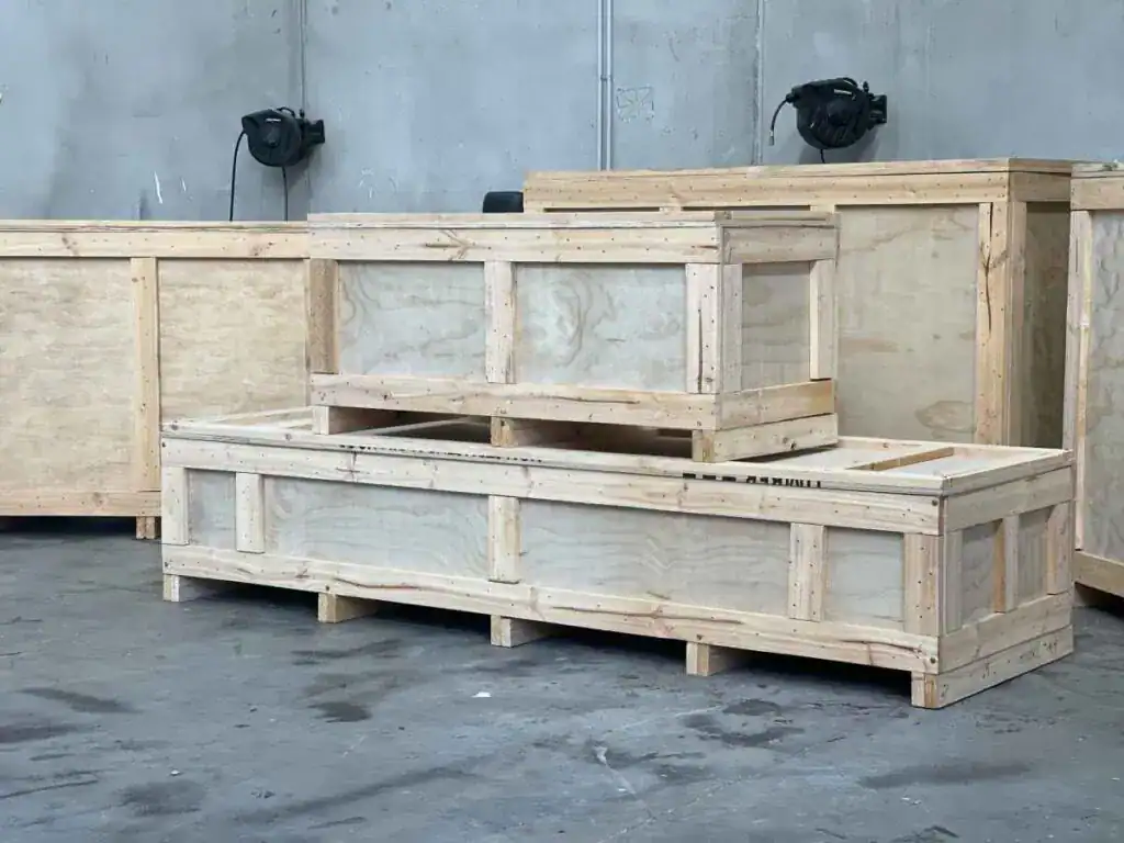 plywood boxes stacked with plywood boxes in background